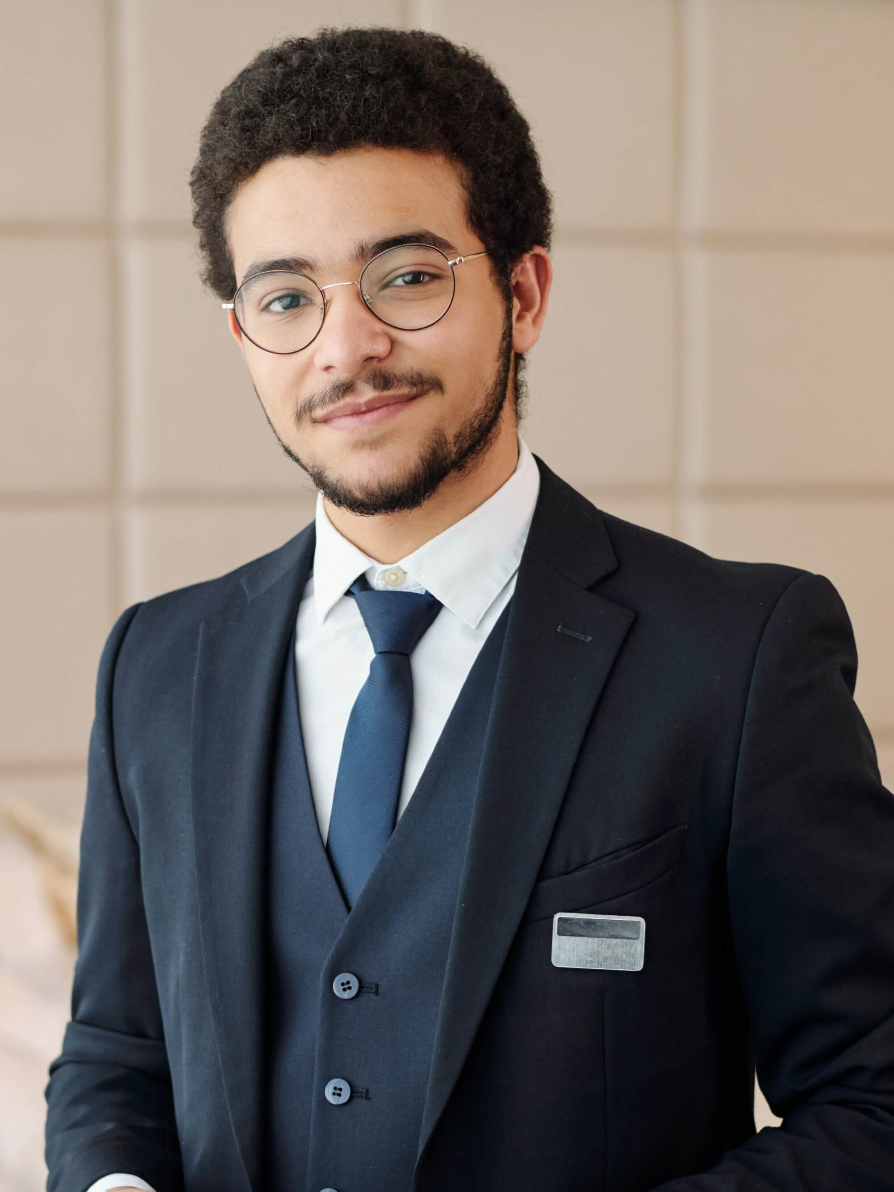 young-confident-head-manager-of-luxurious-hotel-lo-2025-03-14-22-10-53-utc.jpg